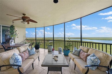 Sunroom / solarium with ceiling fan and a water vi