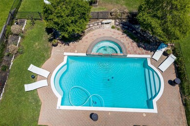 View of swimming pool featuring a yard, an in grou