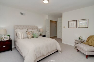 Master suite offers plenty of room for king size bed.