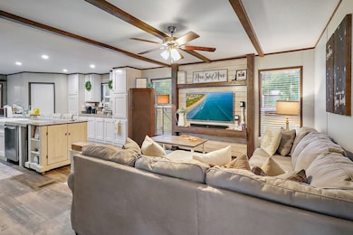 The living area is right as you enter the home.