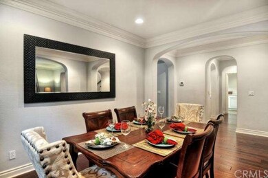 Formal Dining Room Opens to the Living Room for Easy Entertaining