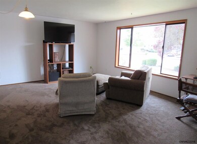 Living room with large window.