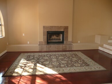 LIVING ROOM W/HARDWOOD FLRS & FIREPLACE