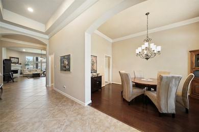 Lovely formal dining area has butler's pantry for buffet style entertaining.