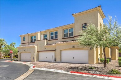 Mediterranean / spanish-style house featuring a ga