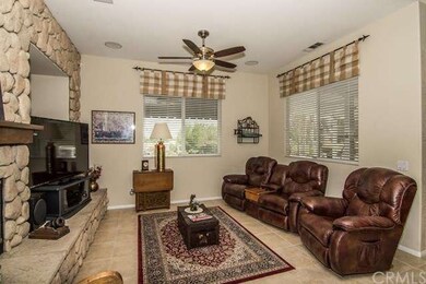 Family room with large stone fireplace
