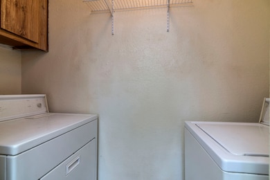 Laundry room at end of kitchen