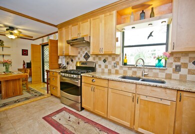 Kitchen With Upgrades & Backyard Views!