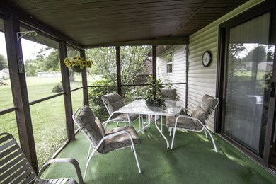 screened in sunporch off of kitchen
