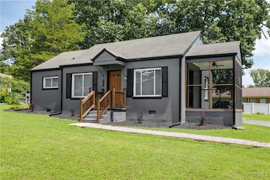 Bungalow-style house featuring a front yard, a shi