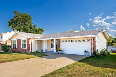 Ranch-style house featuring brick siding, a front lawn, concrete driveway, an attached garage, and roof with shingles