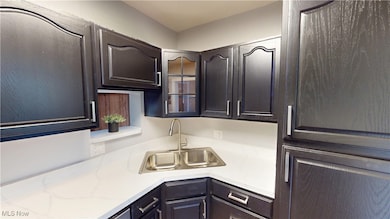 Kitchen featuring glass insert cabinets