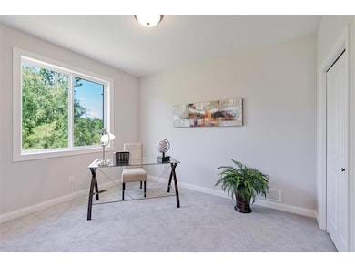 Photo is of a similar model.