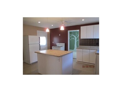 Kitchen has tiled floors