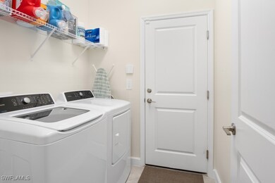 Laundry area with independent washer and dryer, ba
