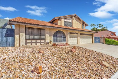 View of front of home featuring fence, stucco sidi