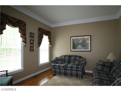 Living Room - Dentil molding, wood floors, could b