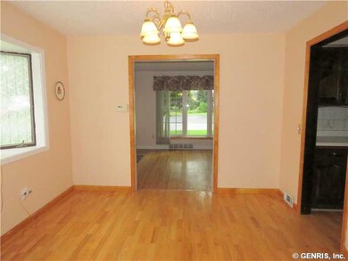 Dining Room Formal Dining with Hardwoods opens to 