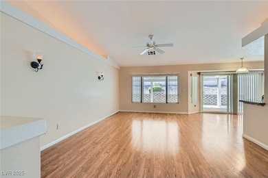 Unfurnished living room featuring light wood-style