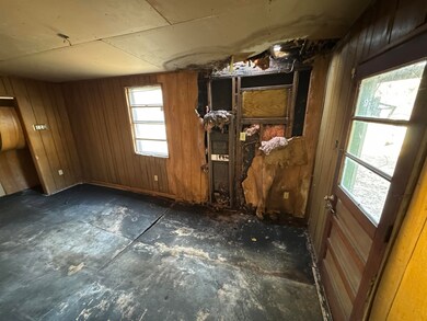 Miscellaneous room with wooden walls