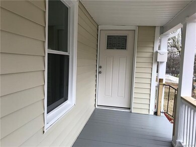 Large front porch overlooking peaceful surrounding