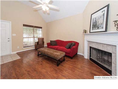 Cozy fireplace with 2 large windows for natural li
