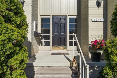 Property entrance with brick siding