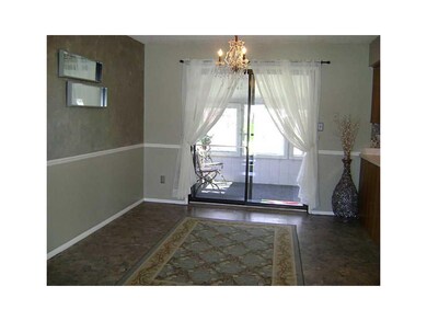 Dining Area. Sliding Door to Screened Porch