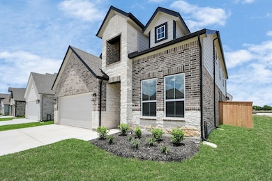 This home boasts lush green grass and meticulous l
