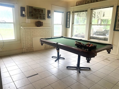 Recreation room featuring plenty of natural light