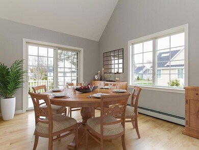 The dining room virtually staged to...