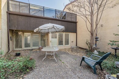 Back of house featuring a patio and stucco siding