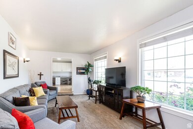 Living room with large windows and mountain views