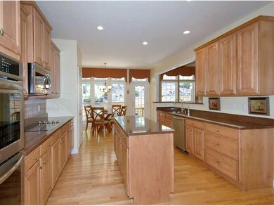 Kitchen. The gourmet island kitchen is equipped wi