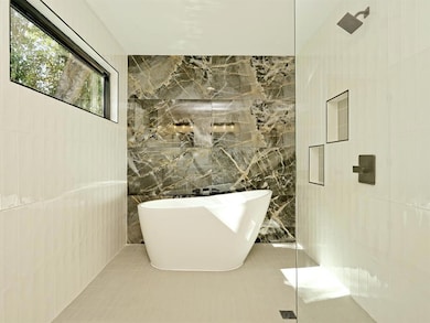 Full bathroom featuring tile patterned flooring, 