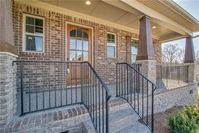 Imagine drinking coffee in the morning on this fantastic front porch!