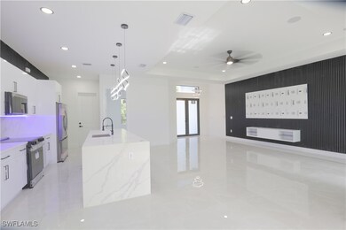 Kitchen featuring stainless steel appliances, mode