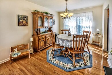 Spacious Dining Room with Hardwood Floors.