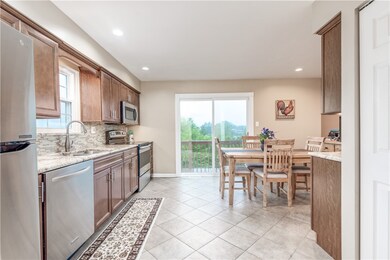 Updated kitchen with stainless steel appliances an