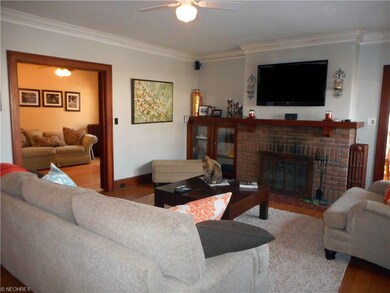 Wood Burning Fireplace and Gleaming Wood Floor