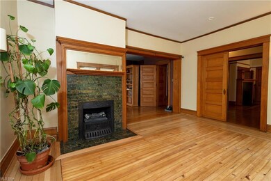 Double parlours with original coal fireplaces with