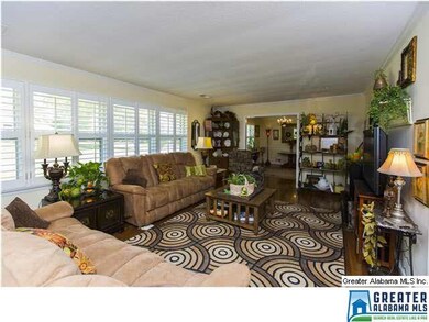 Huge Living Room w/ hardwood floors & custom plant