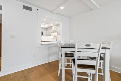 Kitchen/Dining Area Counter can accommodate bar stools or be used as a food serving area.