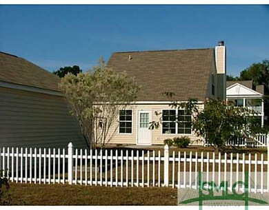 Exterior Back. Fenced in yard for children and pet