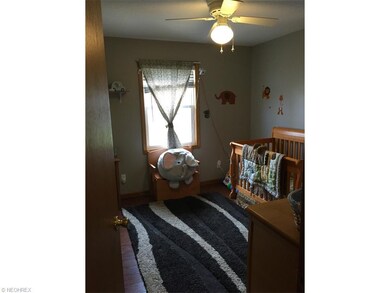 One of three guest bedrooms