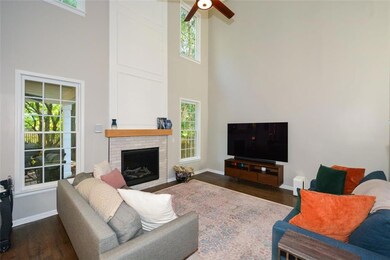 Two-story Great Room with new direct vent gas logs, new tile surround and mantle