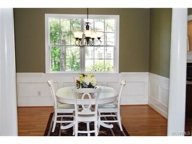 Formal Dining Room - Hardwood Floors, Crown Moldin