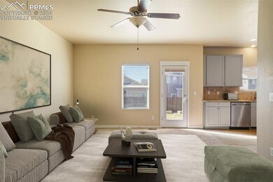 *virtually staged* Living room with ceiling fan