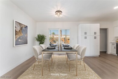 Dining room featuring light wood-style flooring an