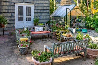 Both the living room and kitchen offer access to the patio.